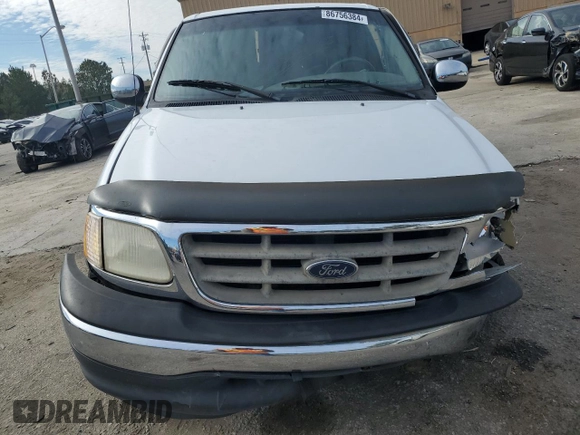 2001 Ford F-150 XL with VIN 1FTRX17L21NA52159, listed as a Copart auction lot 86756384 with Not provided miles and Salvage title. Bid and sale history available at DreamBid. Image 5.