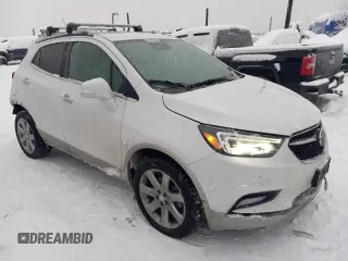 2019 Buick Encore Essence with VIN KL4CJGSM5KB738932, listed as a Copart auction lot 83087444 with 59,162 mi miles and Salvage Title. Bid and sale history available at DreamBid. Image 4.