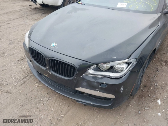 2015 BMW 7 Series 750i xDrive with VIN WBAYB6C57FD965802, listed as a IAAI auction lot 40588698 with 999,999 mi miles. Bid and sale history available at carsss.com. Image 6.