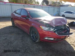2018 Ford Fusion SE z VIN 3FA6P0HD5JR165076, wystawiony jako IAAI lot #41216260 z przebiegiem 33 864 mil mil oraz . Historia ofert i sprzedaży dostępna na DreamBid. Obrazek 1.