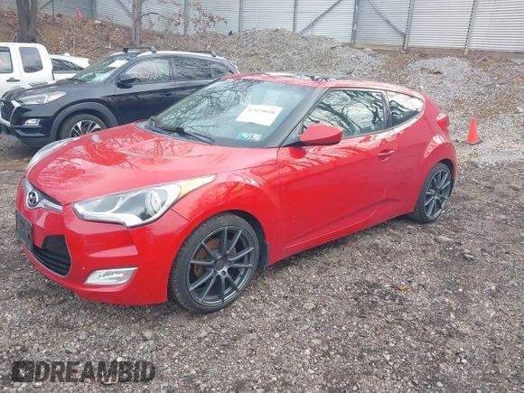2012 Hyundai Veloster w/Black Int z VIN KMHTC6AD4CU072868, wystawiony jako IAAI lot #42029030 z przebiegiem 112 817 mil mil oraz . Historia ofert i sprzedaży dostępna na DreamBid. Obrazek 2.