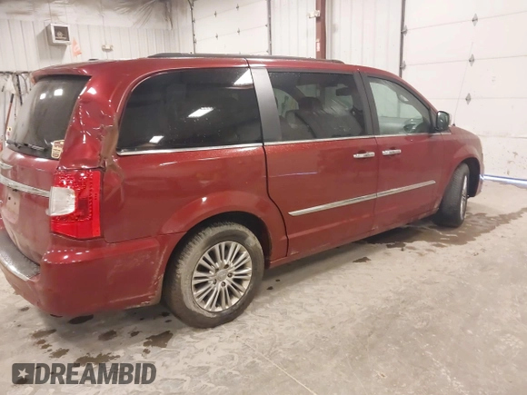 2015 Chrysler Town & Country Touring L with VIN 2C4RC1CG8FR525304, listed as a IAAI auction lot 41829438 with 125,587 mi miles and . Bid and sale history available at DreamBid. Image 4.