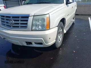2005 Cadillac Escalade z VIN 1GYEC63T55R114823, wystawiony jako IAAI lot #41931065 z przebiegiem Nie podano mil oraz . Historia ofert i sprzedaży dostępna na DreamBid. Obrazek 6.