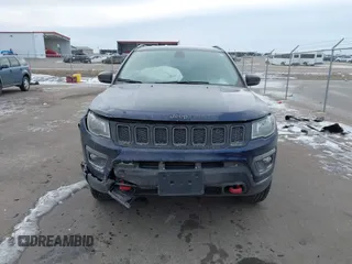 2020 Jeep Compass Trailhawk with VIN 3C4NJDDB3LT143926, listed as a IAAI auction lot 41368613 with 61,909 mi miles and . Bid and sale history available at carsss.com. Image 12.