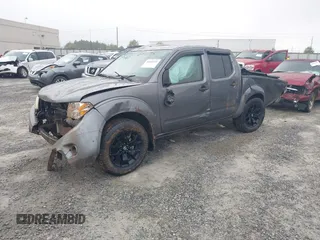 2021 Nissan Frontier SV z VIN 1N6ED0EA6MN713258, wystawiony jako IAAI lot #40820539 z przebiegiem 86 364 mil mil oraz . Historia ofert i sprzedaży dostępna na DreamBid. Obrazek 2.
