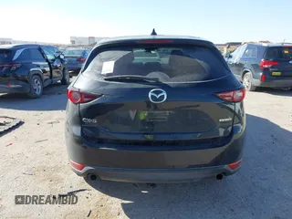 2020 Mazda CX-5 Touring with VIN JM3KFACM0L0780265, listed as a IAAI auction lot 41825873 with 151,888 mi miles. Bid and sale history available at carsss.com. Image 16.