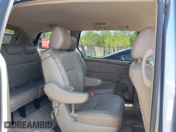 2009 Toyota Sienna XLE with VIN 5TDZK22C99S239755, listed as a IAAI auction lot 42096411 with 214,983 mi miles. Bid and sale history available at carsss.com. Image 8.