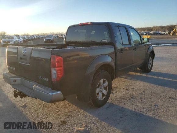 2010 Nissan Frontier SE with VIN 1N6AD0EV6AC404172, listed as a Copart auction lot 83233344 with 301,326 mi miles and Salvage title. Bid and sale history available at DreamBid. Image 3.