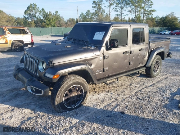 2023 Jeep Gladiator Overland with VIN 1C6HJTFG1PL546604, listed as a IAAI auction lot 41599632 with 23,108 mi miles. Bid and sale history available at carsss.com. Image 18.