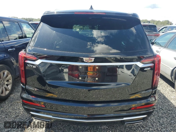 2020 Cadillac XT6 FWD Premium Luxury with VIN 1GYKPCRS8LZ178243, listed as a Copart auction lot 74697464 with 0 mi miles and Salvage Title. Bid and sale history available at carsss.com. Image 6.