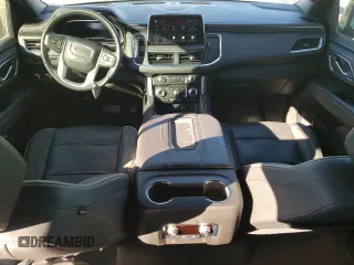 2022 GMC Yukon SLT with VIN 1GKS2BKD5NR356479, listed as a Copart auction lot 77674304 with 33,580 mi miles and Salvage Title. Bid and sale history available at carsss.com. Image 8.