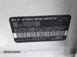 2014 Mitsubishi Lancer Evolution GSR with VIN JA32W8FV5EU012572, listed as a IAAI auction lot 40871463 with 89,529 mi miles. Bid and sale history available at carsss.com. Image 9.