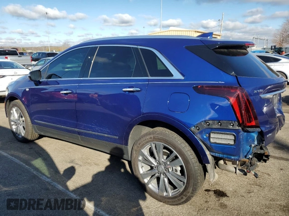 2023 Cadillac XT5 AWD Premium Luxury with VIN 1GYKNDR49PZ135890, listed as a Copart auction lot 79808584 with 21,708 mi miles and Salvage Title. Bid and sale history available at DreamBid. Image 2.