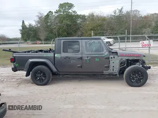 2022 Jeep Gladiator Texas Trail z VIN 1C6HJTAG0NL162804, wystawiony jako IAAI lot #41524087 z przebiegiem 17 652 mil mil oraz . Historia ofert i sprzedaży dostępna na DreamBid. Obrazek 14.