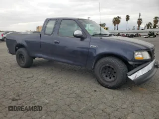 2000 Ford F-150 XL with VIN 1FTZX1721YKB14556, listed as a Copart auction lot 53227925 with 0 mi miles and Salvage Title. Bid and sale history available at carsss.com. Image 4.