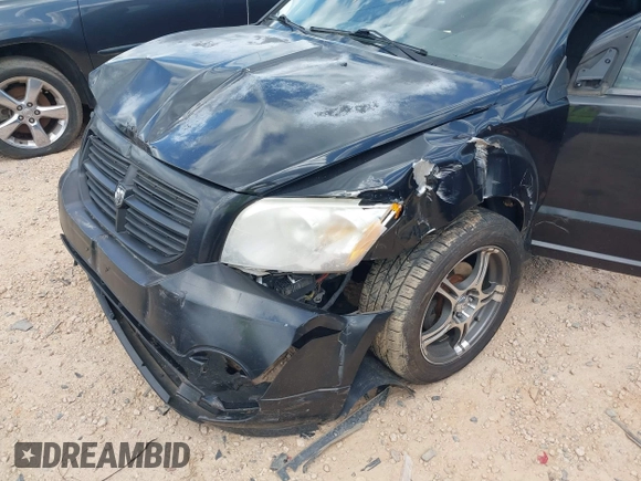 2008 Dodge Caliber SE z VIN 1B3HB28BX8D674547, wystawiony jako IAAI lot #42140339 z przebiegiem 236 666 mil mil oraz . Historia ofert i sprzedaży dostępna na DreamBid. Obrazek 6.