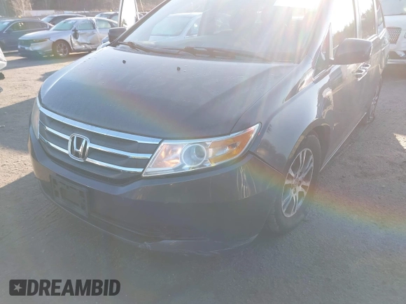 2013 Honda Odyssey EX-L with VIN 5FNRL5H64DB034860, listed as a IAAI auction lot 42013204 with 104,314 mi miles and . Bid and sale history available at carsss.com. Image 6.