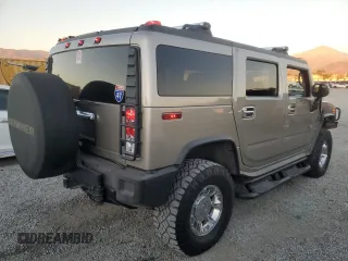 2003 Hummer H2 with VIN 5GRGN23U33H124696, listed as a Copart auction lot 79452004 with 154,144 mi miles and Salvage Title. Bid and sale history available at carsss.com. Image 3.