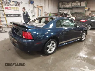 2002 Ford Mustang Standard z VIN 1FAFP40452F117630, wystawiony jako IAAI lot #41882744 z przebiegiem 85 218 mil mil oraz . Historia ofert i sprzedaży dostępna na DreamBid. Obrazek 4.