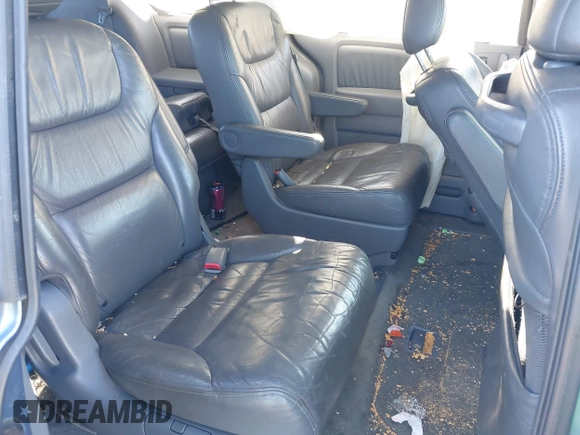 2005 Honda Odyssey EX-L with VIN 5FNRL38765B076591, listed as a IAAI auction lot 41624354 with 172,698 mi miles and . Bid and sale history available at DreamBid. Image 8.