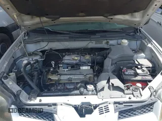 2003 Mitsubishi Outlander LS z VIN JA4LX31G63U061530, wystawiony jako IAAI lot #42367298 z przebiegiem 198 887 mil mil oraz . Historia ofert i sprzedaży dostępna na DreamBid. Obrazek 10.