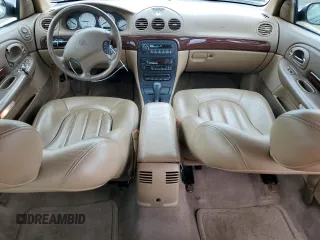 2000 Chrysler 300M M z VIN 2C3HE66G4YH423056, wystawiony jako Copart lot #71347034 z przebiegiem 112 595 mil mil oraz Szkoda całkowita • Salvage title. Historia ofert i sprzedaży dostępna na DreamBid. Obrazek 8.