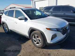 2022 Hyundai Tucson SEL with VIN KM8JB3AE8NU033575, listed as a IAAI auction lot 41662009 with 54,971 mi miles. Bid and sale history available at carsss.com. Image 1.