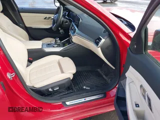 2022 BMW 3 Series M340i xDrive with VIN WBA5U9C01NFM09684, listed as a IAAI auction lot 41670169 with 38,640 mi miles and . Bid and sale history available at DreamBid. Image 5.