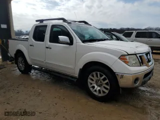 2009 Nissan Frontier SE with VIN 1N6AD07U39C426677, listed as a Copart auction lot 43524135 with 183,168 mi miles and Salvage Title. Bid and sale history available at carsss.com. Image 4.