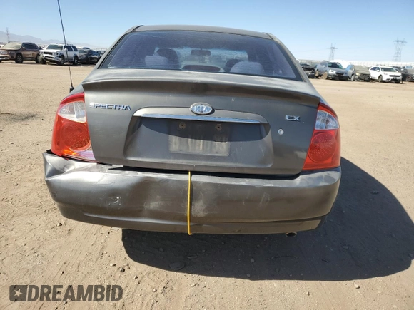 2006 Kia Spectra EX with VIN KNAFE122X65277053, listed as a Copart auction lot 75697314 with 147,156 mi miles and Salvage Title. Bid and sale history available at carsss.com. Image 6.