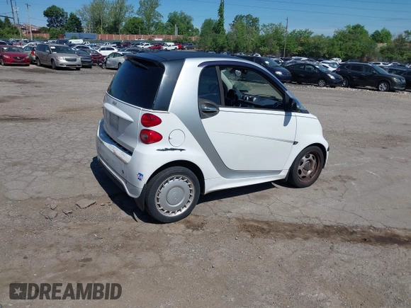 2015 Smart fortwo Passion with VIN WMEEJ3BAXFK810065, listed as a IAAI auction lot 42212154 with 20,553 mi miles and . Bid and sale history available at DreamBid. Image 4.