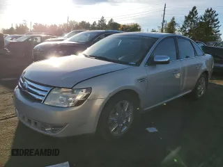 2009 Ford Taurus Limited with VIN 1FAHP25W89G101188, listed as a Copart auction lot 77220984 with 149,142 mi miles and Salvage Title. Bid and sale history available at carsss.com. Image 1.