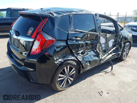 2015 Honda Fit EX-L z VIN 3HGGK5H81FM705199, wystawiony jako IAAI lot #42310099 z przebiegiem Nie podano mil oraz . Historia ofert i sprzedaży dostępna na DreamBid. Obrazek 4.