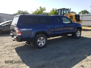2014 Toyota Tacoma with VIN 5TFUU4EN4EX093945, listed as a Copart auction lot 58975405 with 111,695 mi miles and Salvage title. Bid and sale history available at DreamBid. Image 3.
