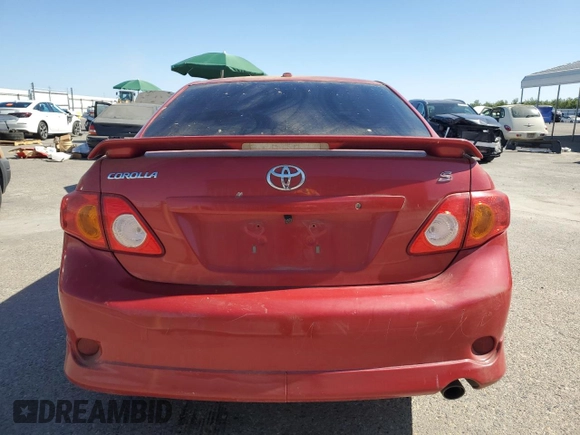 2010 Toyota Corolla z VIN 1NXBU4EE3AZ197969, wystawiony jako Copart lot #60699805 z przebiegiem 197 072 mil mil oraz Szkoda całkowita • Salvage title. Historia ofert i sprzedaży dostępna na DreamBid. Obrazek 6.