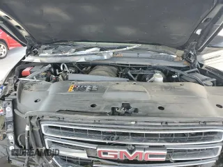 2019 GMC Yukon SLT with VIN 1GKS2BKCXKR108358, listed as a Copart auction lot 83765624 with 127,724 mi miles and Salvage Title. Bid and sale history available at carsss.com. Image 12.