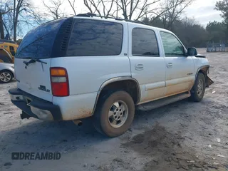 2002 Chevrolet Tahoe LS with VIN 1GNEC13Z52R329554, listed as a IAAI auction lot 41629942 with 232,374 mi miles and . Bid and sale history available at DreamBid. Image 4.