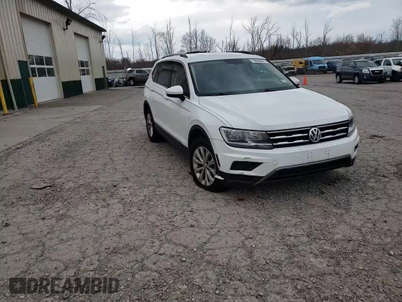 2018 Volkswagen Tiguan SEL with VIN 3VV2B7AX9JM065985, listed as a Copart auction lot 79404694 with Not provided miles and Salvage title. Bid and sale history available at DreamBid. Image 14.