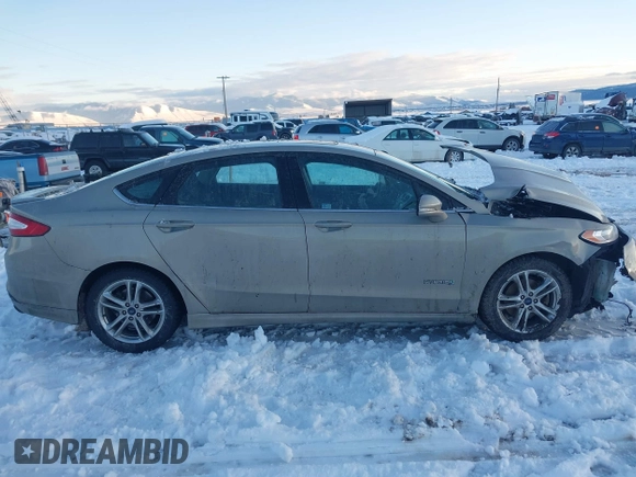 2016 Ford Fusion SE Hybrid with VIN 3FA6P0LU8GR127311, listed as a IAAI auction lot 41242945 with 1 mi miles. Bid and sale history available at carsss.com. Image 14.