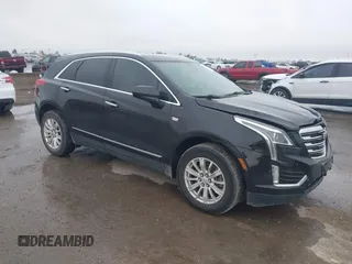 2017 Cadillac XT5 FWD with VIN 1GYKNARS0HZ317508, listed as a IAAI auction lot 40818768 with 132,598 mi miles. Bid and sale history available at carsss.com. Image 1.