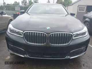 2018 BMW 7 Series 750i z VIN WBA7F0C59JGM23945, wystawiony jako IAAI lot #42236737 z przebiegiem 65 576 mil mil oraz . Historia ofert i sprzedaży dostępna na DreamBid. Obrazek 12.