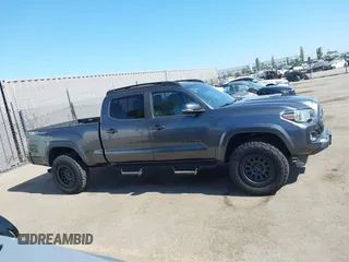 2020 Toyota Tacoma SR5 with VIN 3TMBZ5DN9LM025501, listed as a IAAI auction lot 42680028 with 109,404 mi miles and . Bid and sale history available at DreamBid. Image 13.