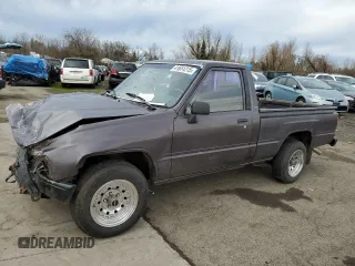 1988 Toyota Pickup with VIN JT4RN50R1J5149025, listed as a Copart auction lot 41651215 with 263,997 mi miles and Salvage Title. Bid and sale history available at DreamBid. Image 1.