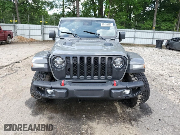 2021 Jeep Gladiator Rubicon с VIN 1C6JJTBG5ML507579, выставлен на аукционе Copart как лот 60409785 с пробегом 62 585 миль миль и Списание • Salvage title. История ставок и продаж доступна на DreamBid. Изображение 5.