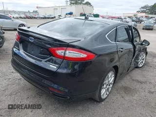 2014 Ford Fusion Titanium with VIN 3FA6P0K92ER355539, listed as a IAAI auction lot 41851471 with 178,176 mi miles and . Bid and sale history available at DreamBid. Image 4.