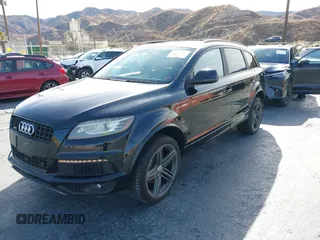 2014 Audi Q7 3.0T S line Prestige with VIN WA1DGAFE8ED003731, listed as a IAAI auction lot 41342173 with 65,118 mi miles. Bid and sale history available at carsss.com. Image 2.