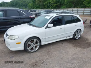 2002 Mazda Protege with VIN JM1BJ245021508764, listed as a IAAI auction lot 42198285 with 237,386 mi miles and . Bid and sale history available at DreamBid. Image 2.