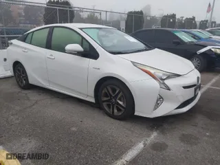 2017 Toyota Prius Two with VIN JTDKARFUXH3037751, listed as a IAAI auction lot 41471974 with 140,787 mi miles. Bid and sale history available at carsss.com. Image 14.