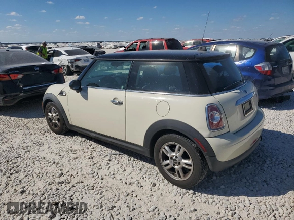 2013 MINI Hardtop with VIN WMWSU3C56DT682857, listed as a Copart auction lot 77677234 with 92,625 mi miles and Clean Title. Bid and sale history available at DreamBid. Image 2.