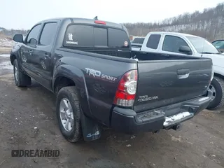 2014 Toyota Tacoma with VIN 3TMLU4EN1EM148353, listed as a IAAI auction lot 41602756 with 89,563 mi miles. Bid and sale history available at carsss.com. Image 3.
